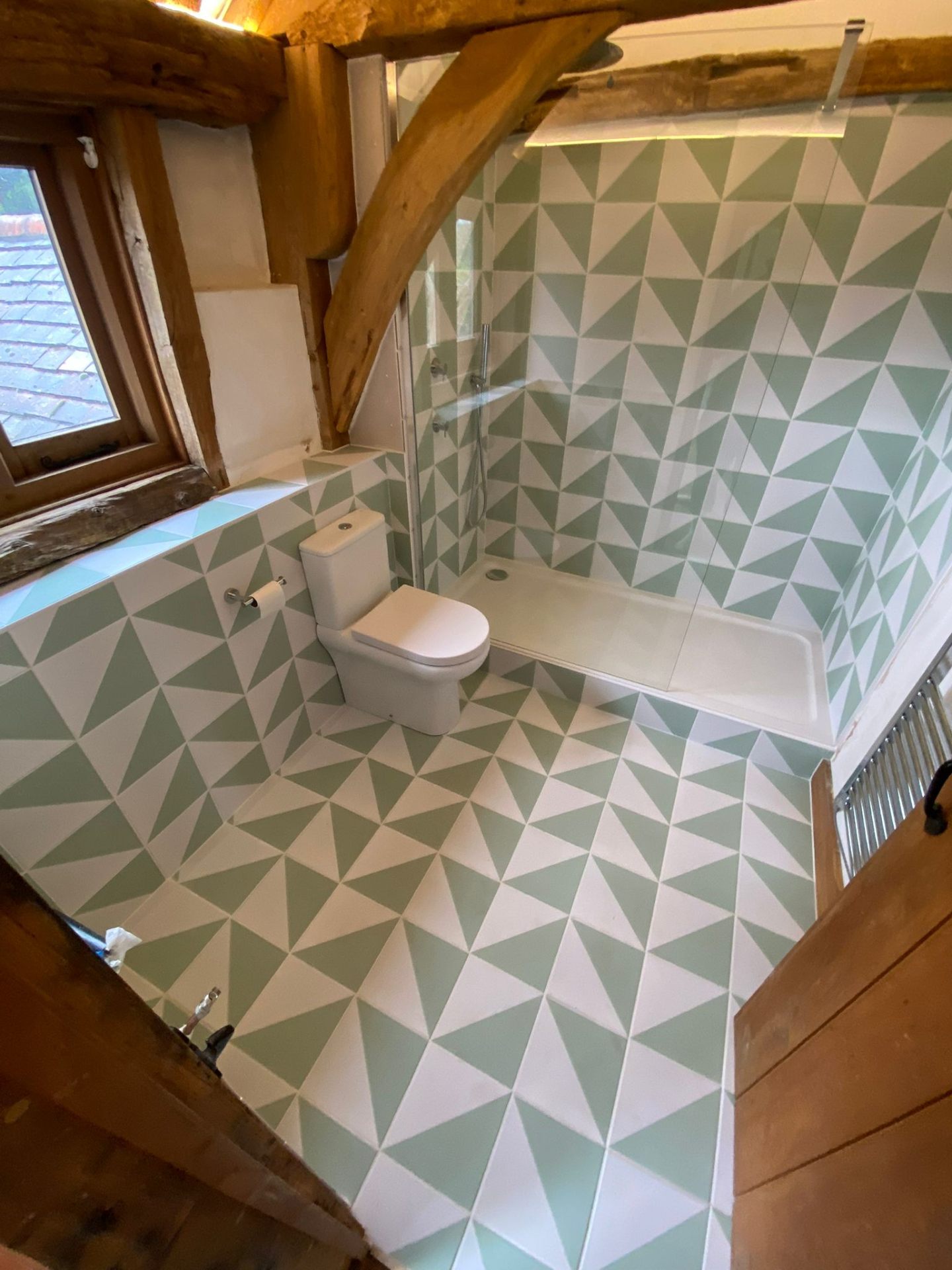 Wet Room with Geometric Tiles — expert bathroom fitting by LUXE Bathrooms East Sussex