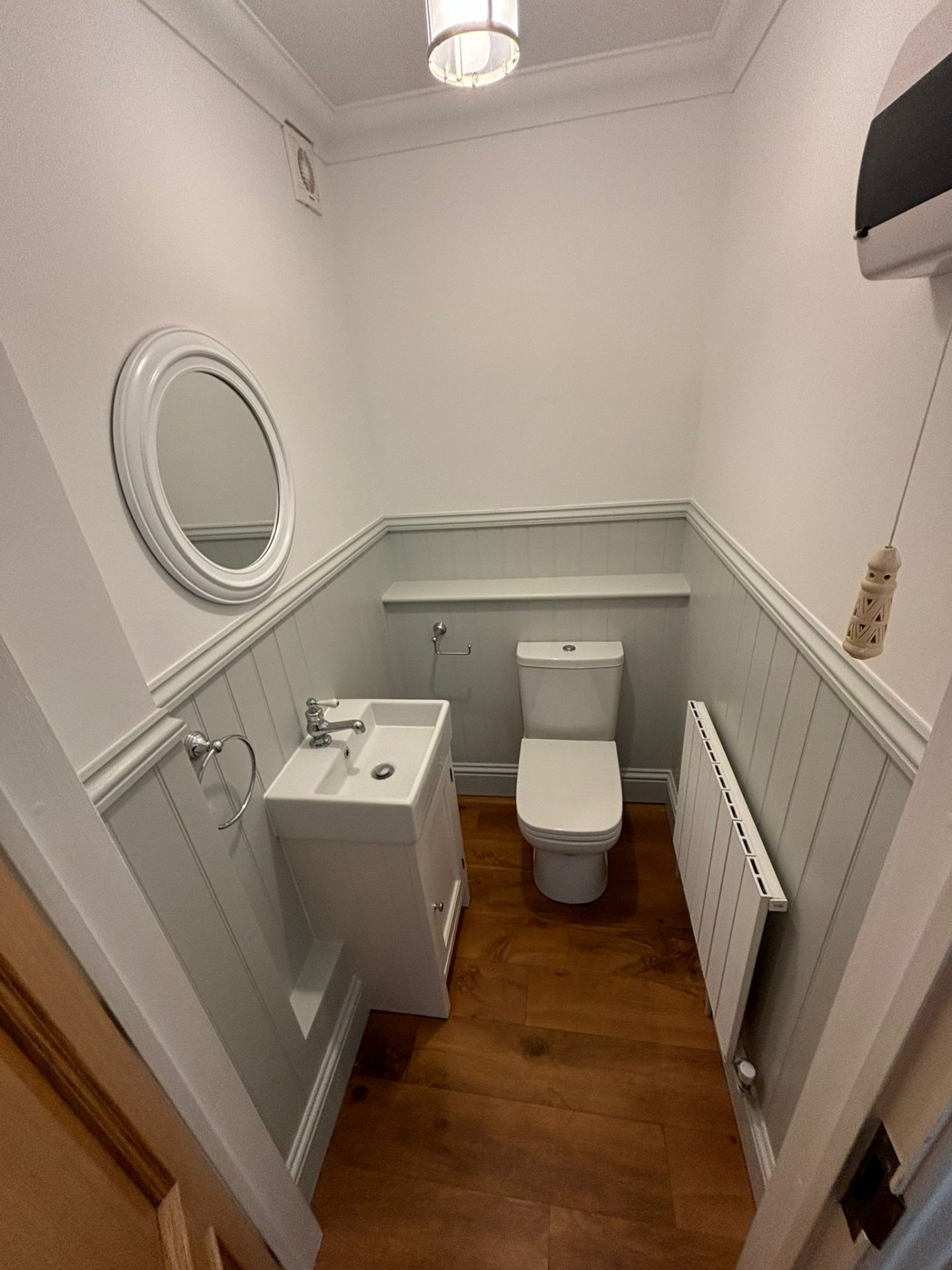 Compact cloakroom installation by LUXE Bathrooms