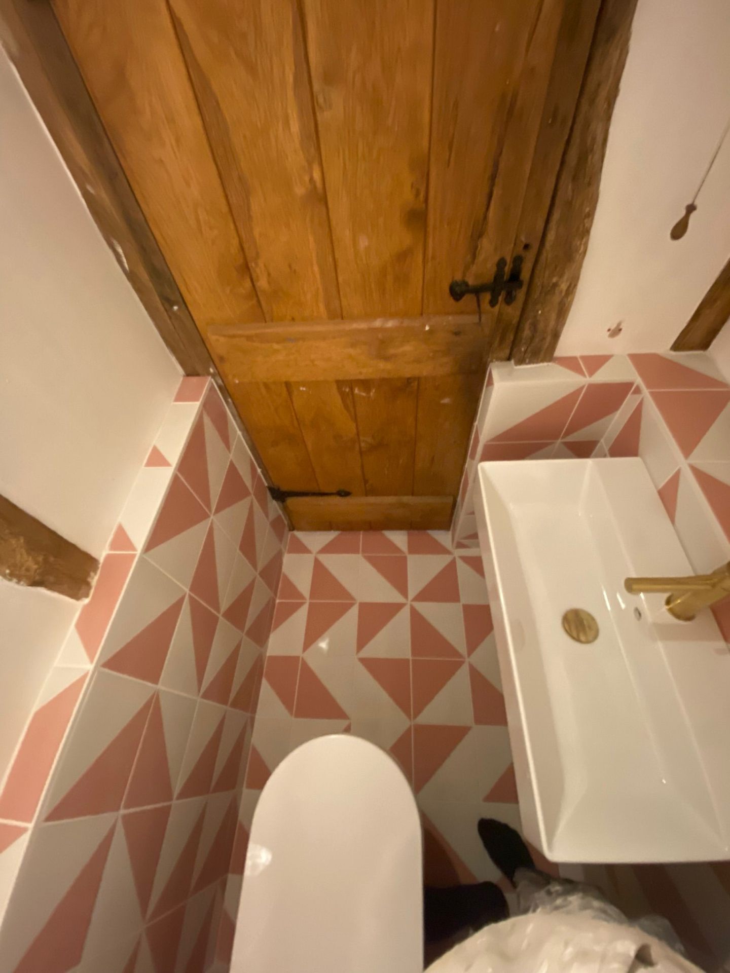 Pink Geometric Cloakroom — Angle View — expert bathroom fitting by LUXE Bathrooms East Sussex